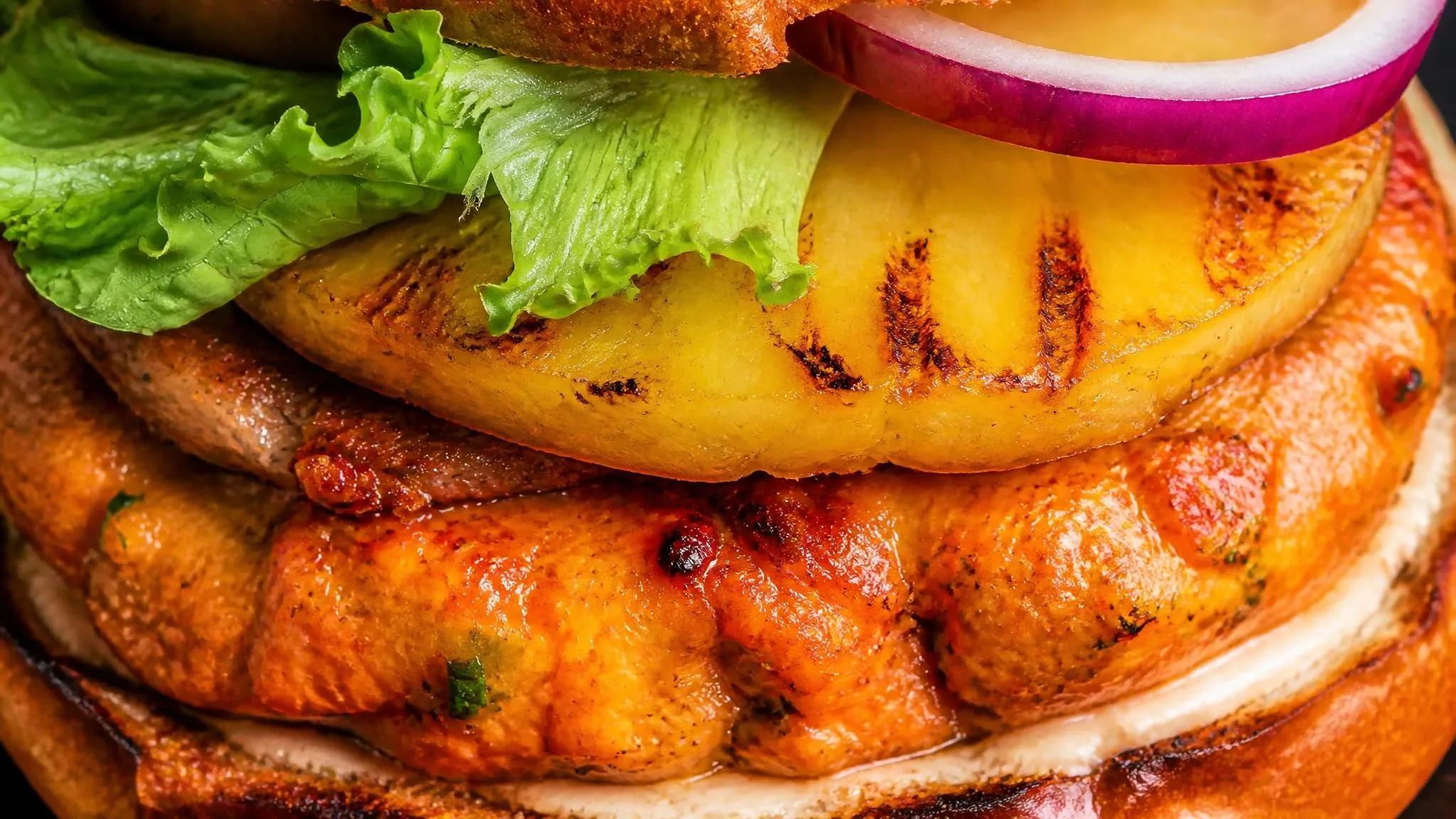 Salmon Burgers with Grilled Pineapple + Jalapeño Slaw